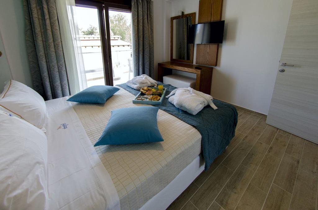 Hatzoudis Luxury Suites Chrysi Ammoudia Exterior foto